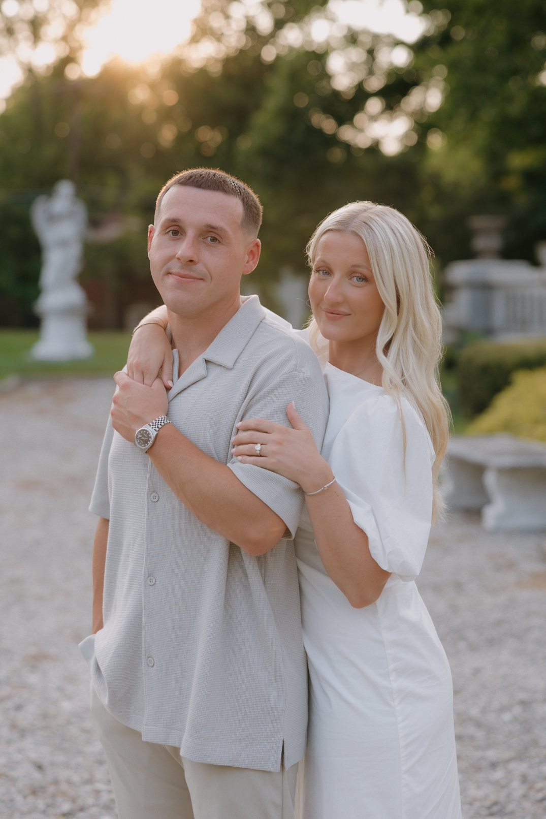 Portrait of the couple standing side by side, looking calmly toward the camera, photographed by Cincinnati photographer.