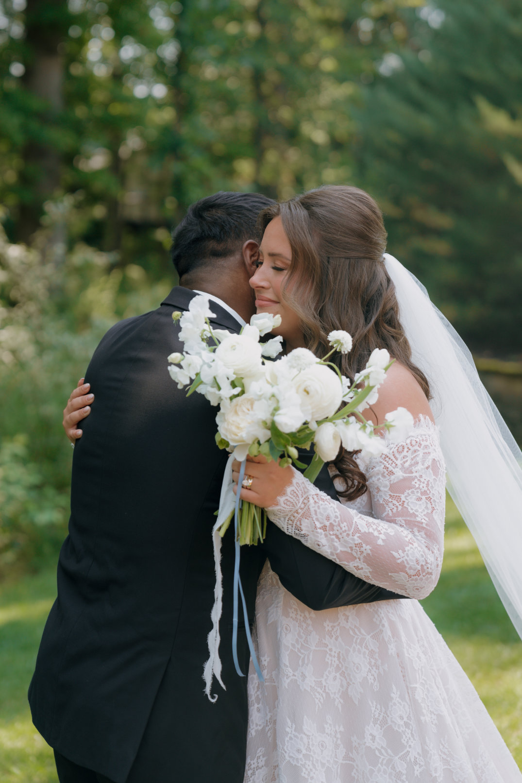 Emotional hug between the couple immediately after exchanging vows.